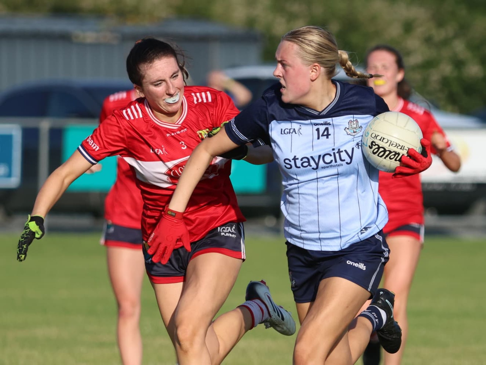 Molly Bourke (Dublin) in action vs Aoife Collins (Cork). Minor All Ireland semi final, July 9th. Credit Maurice Grehan.  Image