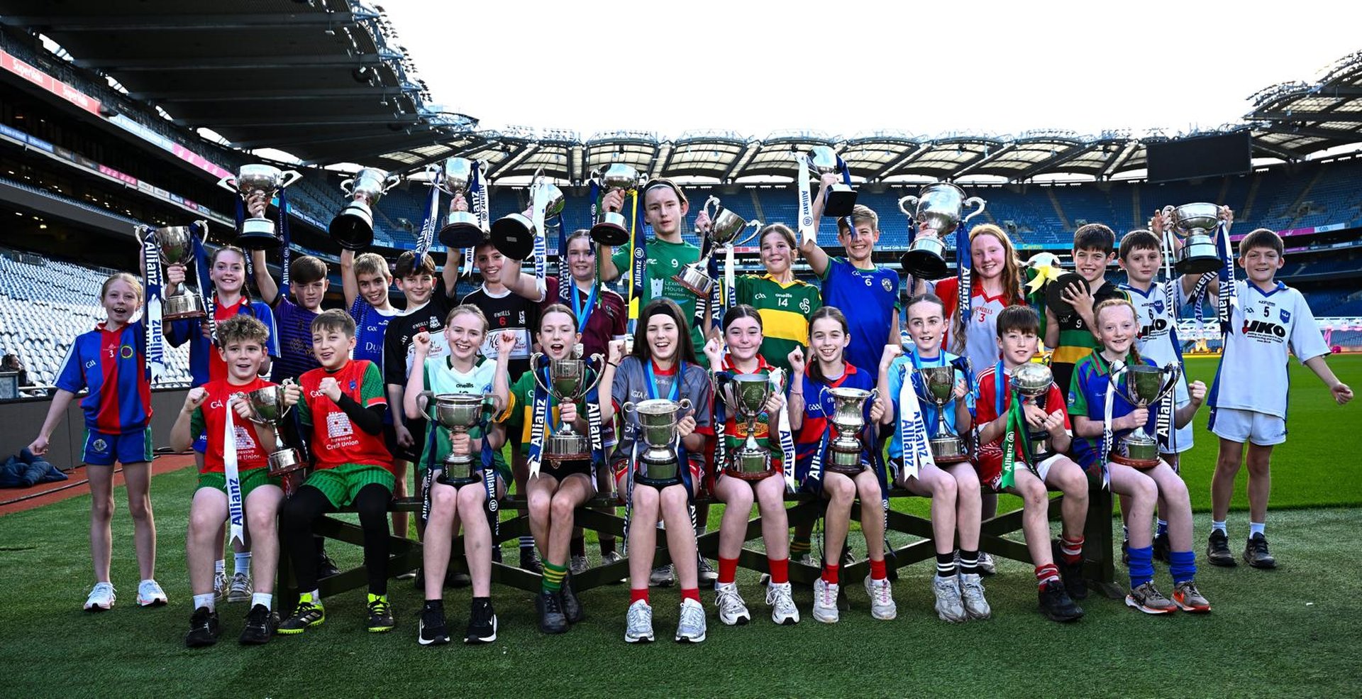 Football captains with their cups in Croke Park Image