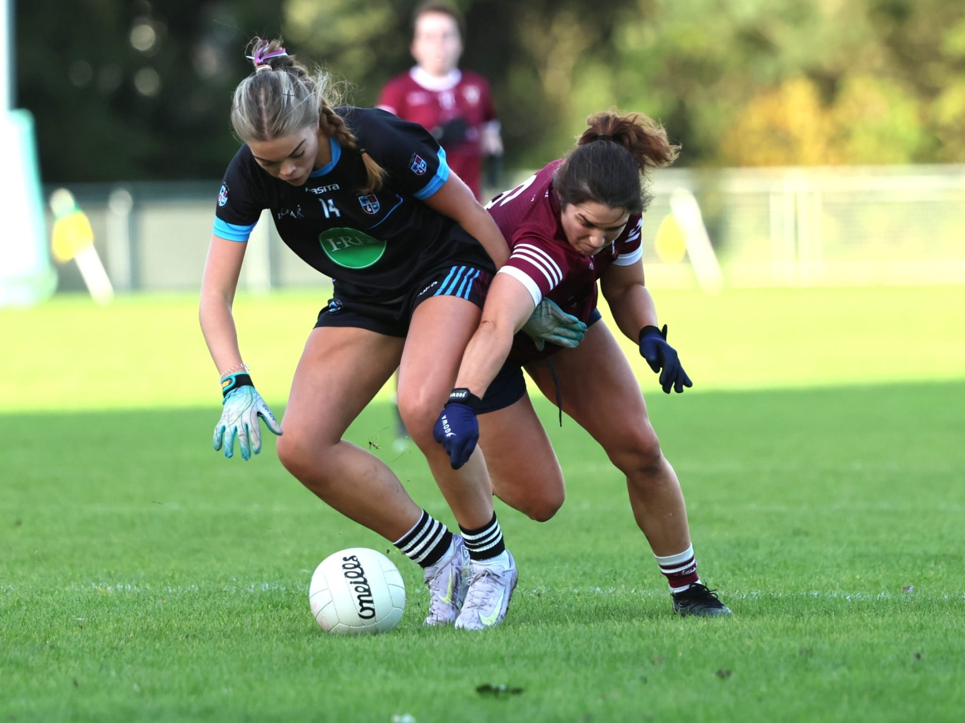 Aobha Phelan (Naomh Olaf) and Niamh Collins (Raheny) pictured during the Go Ahead Ireland Junior championship Final. Oct 4th. Credit Maurice Grehan. Image
