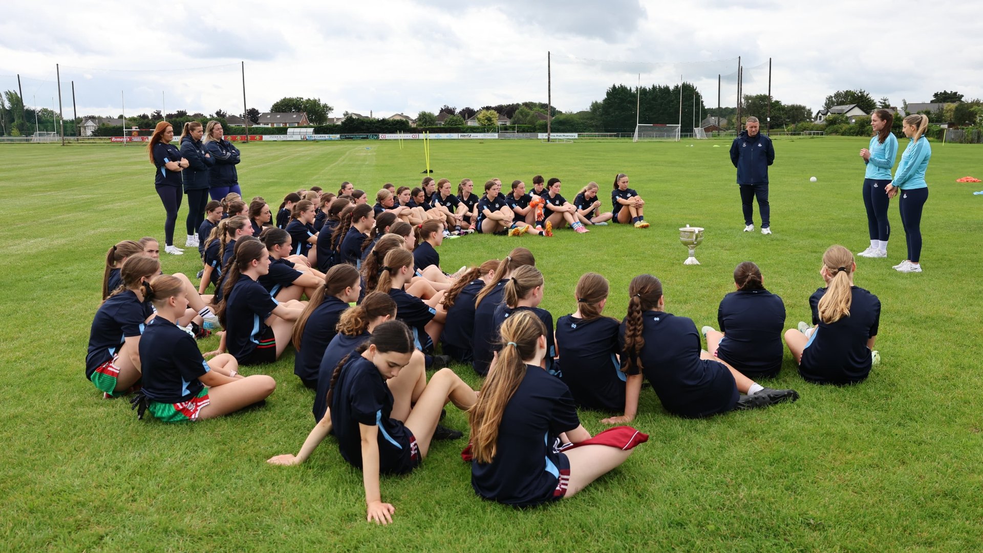 Dublin senior footballers Ashling Nyhan & Rebecca McDonnell chat to participants at the Go Ahead Ireland Dublin LGFA Skills Camp. Thursday August 7th. Credit Maurice Grehan.  Image