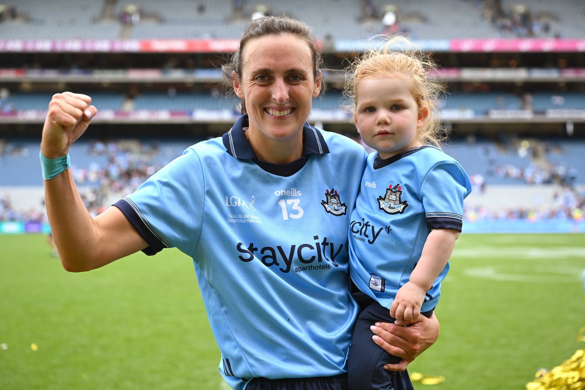 Hannah Tyrrell pictured with her daughter Aoife following Dublin's victory over Meath in the 2025 All Ireland Final. Image Sportsfile. Image